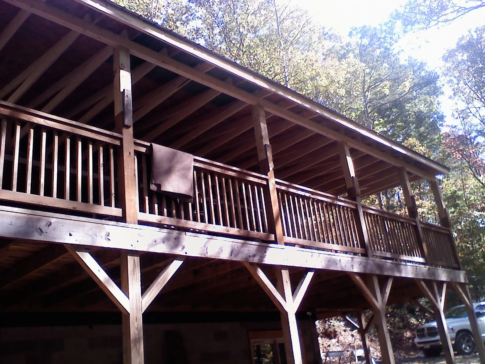 Timber framing under a new elevated porch and deck — Roof Leak Repair in Cliffwood by Roofing Brothers