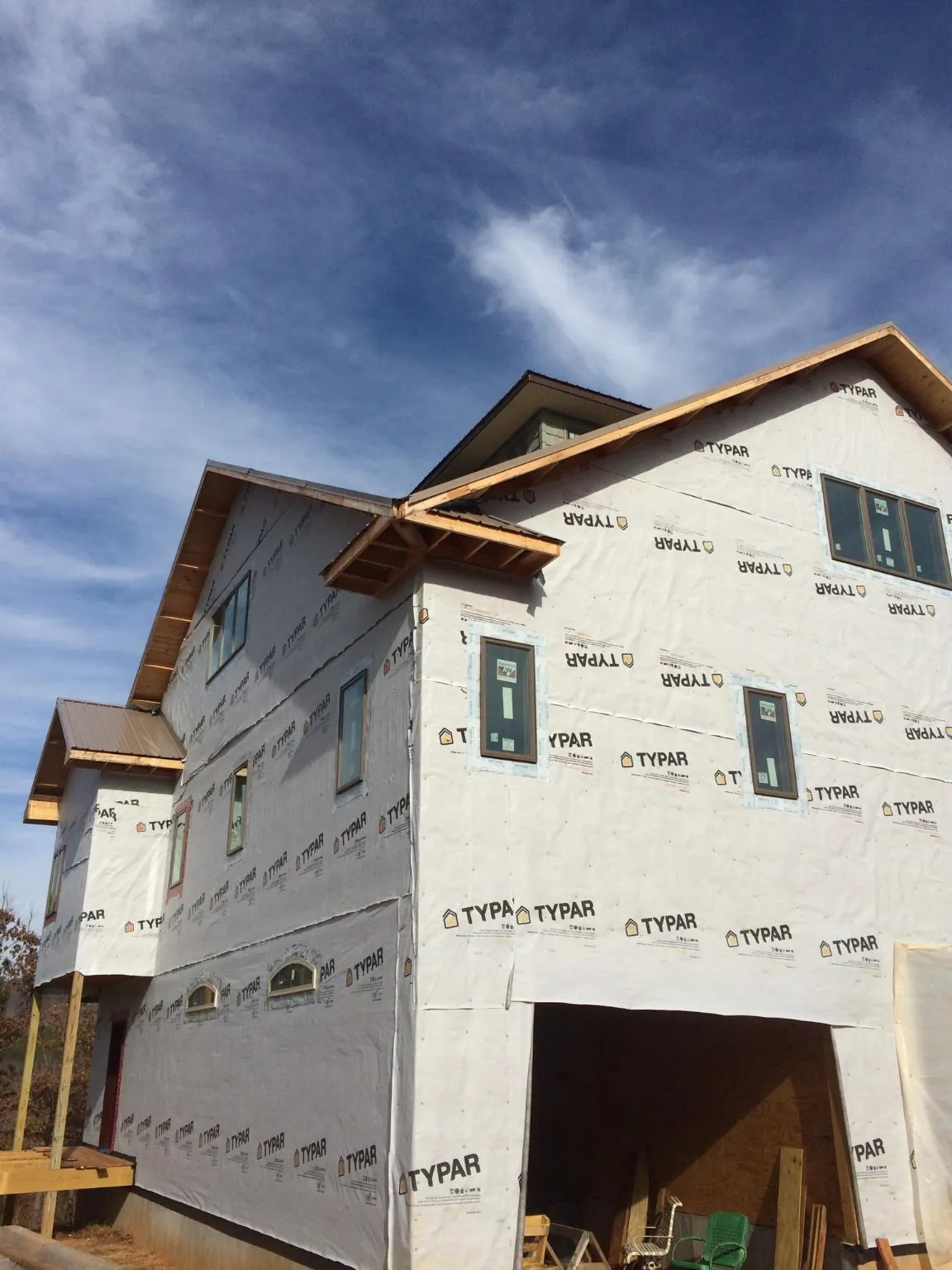 Stick built house wrapped in Typar with new roof framing and dormers in Cliffwood